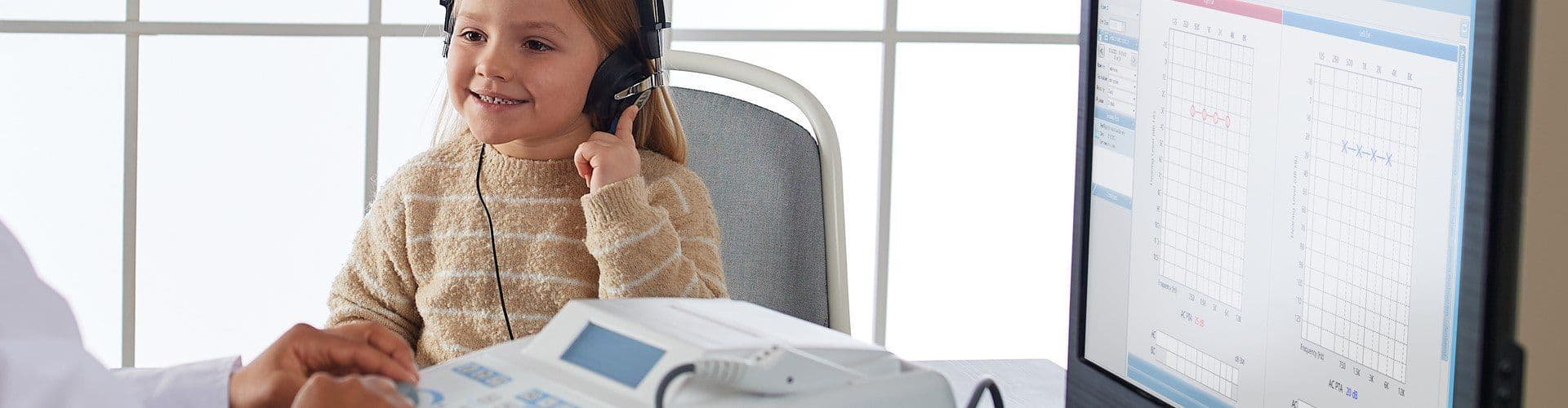 Audiometry testing with the GSI 18 on a child