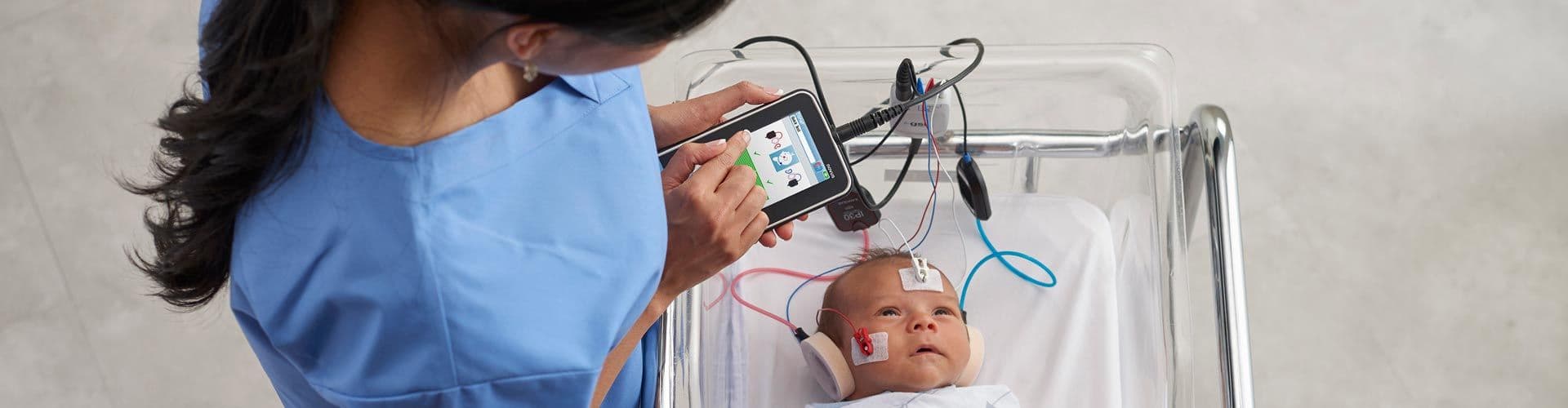 AABR testing being performed on a newborn